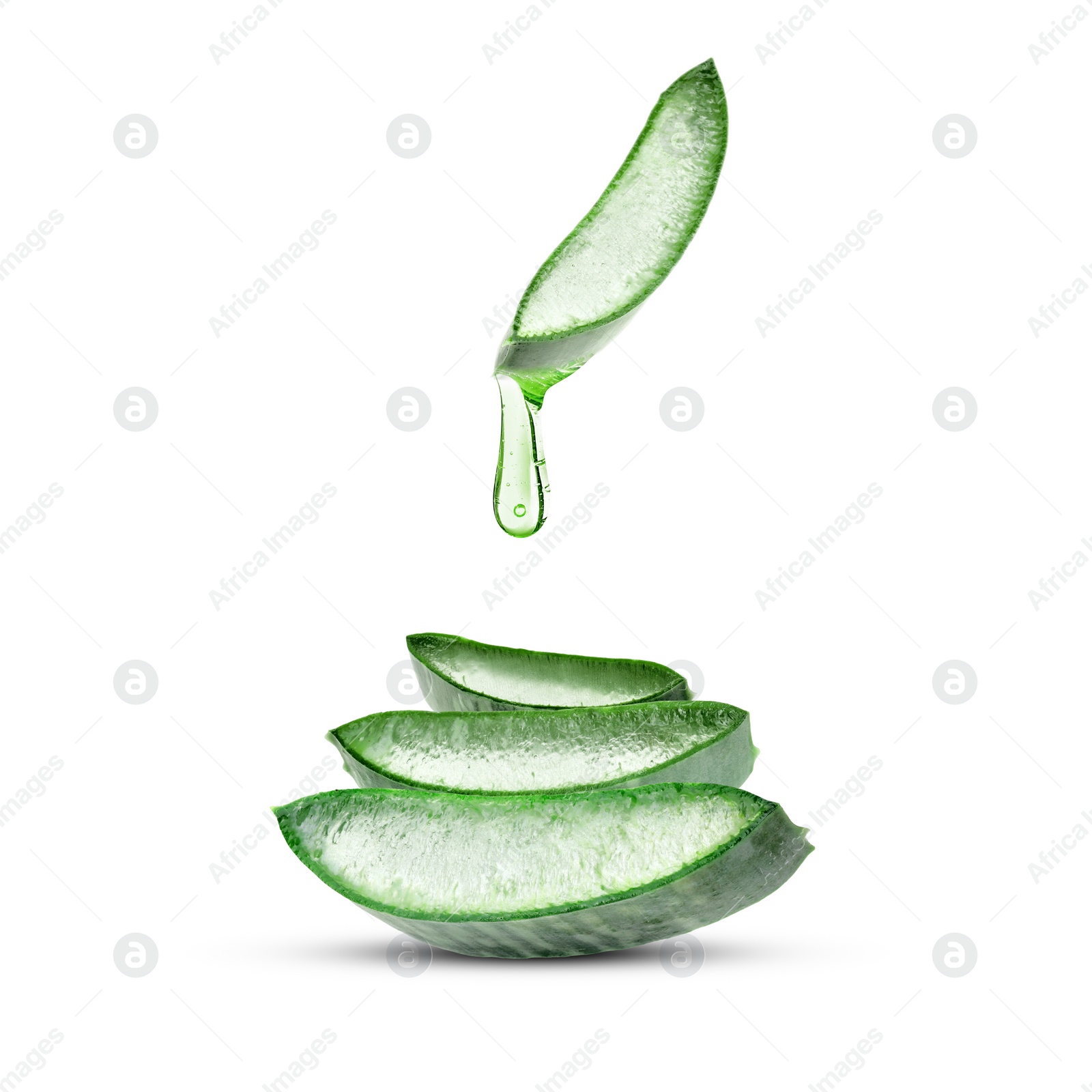 Image of Aloe vera juice dripping from green leaf section on white background