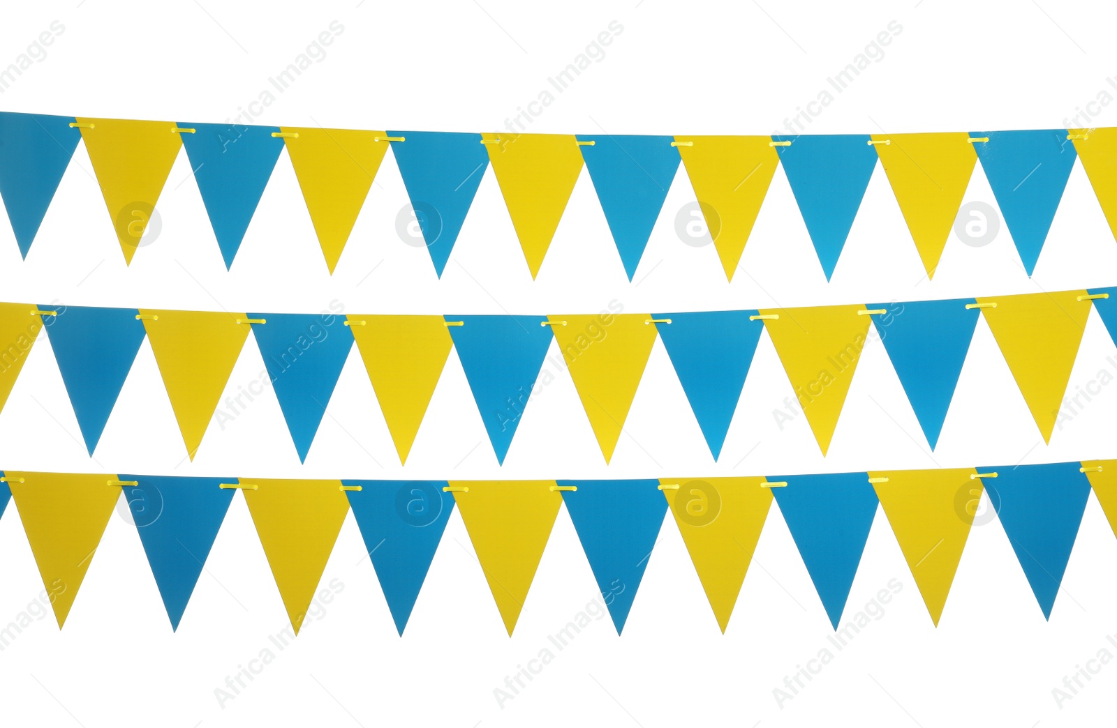 Photo of Buntings with colorful triangular paper flags on white background. Festive decor