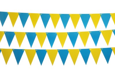 Buntings with colorful triangular paper flags on white background. Festive decor