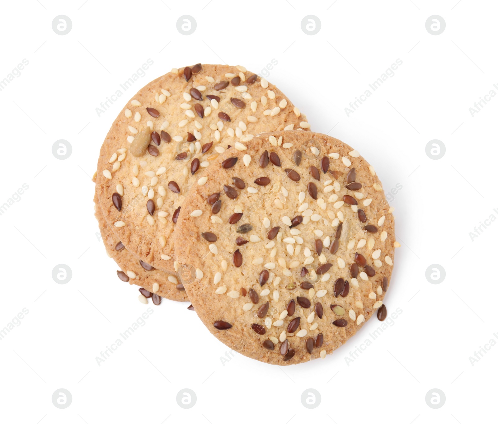 Photo of Round cereal crackers with flax, sunflower and sesame seeds isolated on white, top view