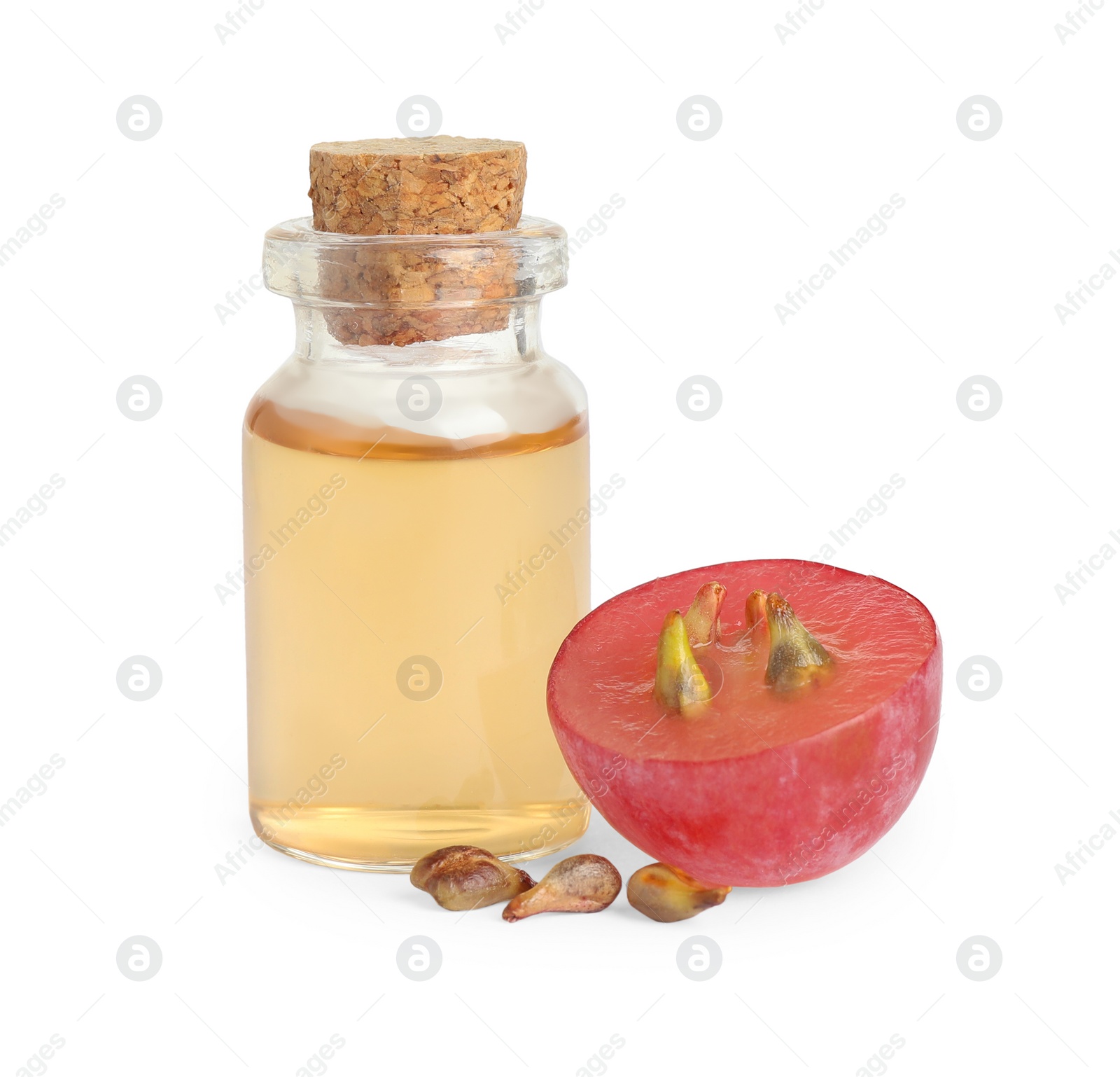 Photo of Organic red grape, seeds and bottle of natural essential oil on white background