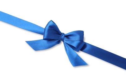 Blue satin ribbon with bow on white background, top view