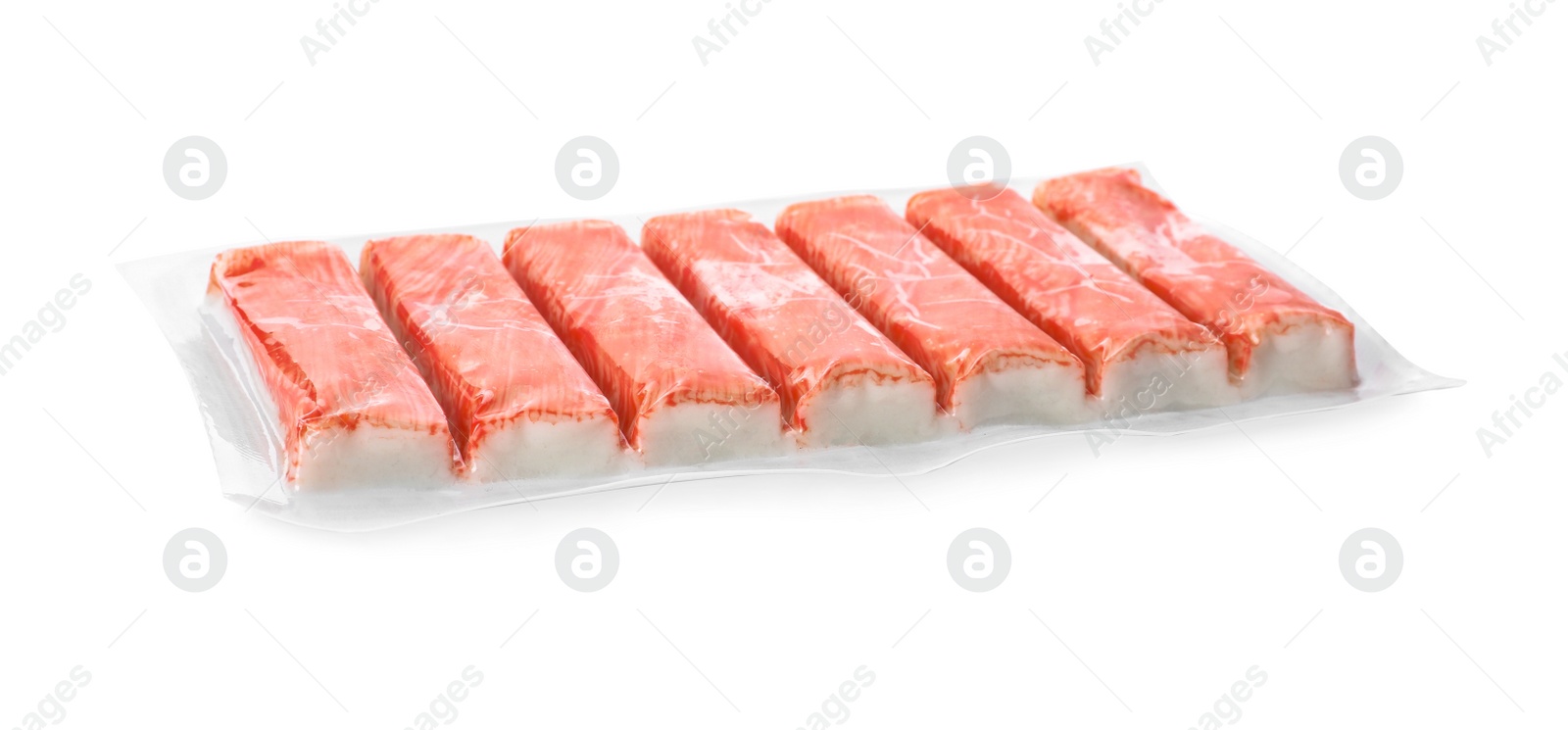 Photo of Pack of fresh crab sticks isolated on white