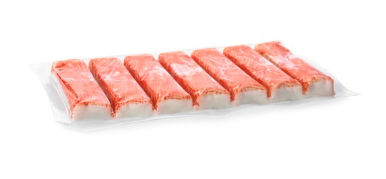 Pack of fresh crab sticks isolated on white