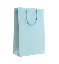 Photo of Light blue paper shopping bag isolated on white