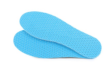 Photo of Pair of breathable shoe insoles isolated on white, top view