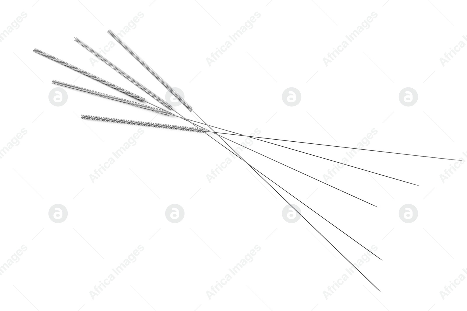 Photo of Many needles for acupuncture on white background