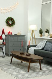 Stylish living room beautifully decorated for Christmas