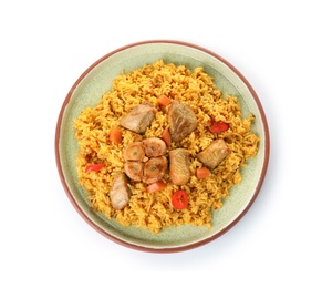 Plate with rice pilaf and meat on white background, top view