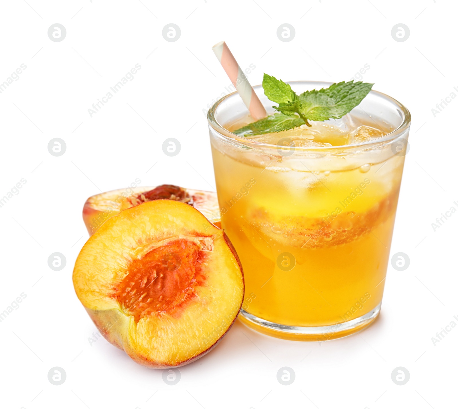 Photo of Peach cocktail in glass and fresh fruit on white background