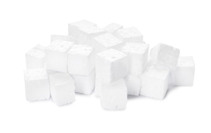 Pile of styrofoam cubes on white background
