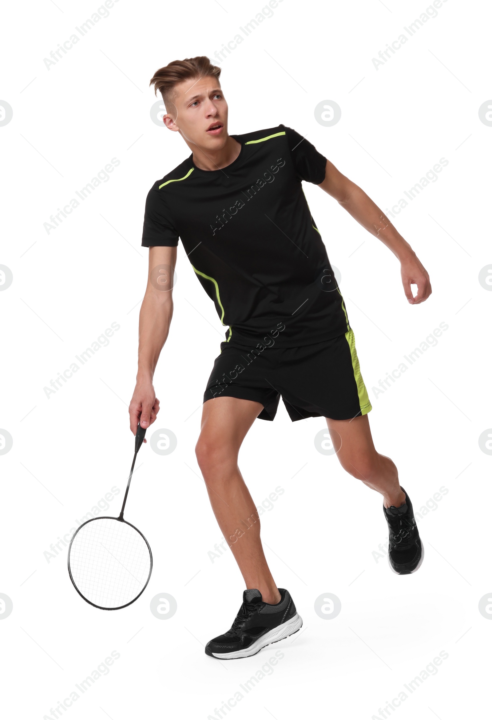 Photo of Young man playing badminton with racket on white background