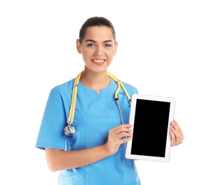 Photo of Portrait of young medical assistant with stethoscope and tablet on white background. Space for text