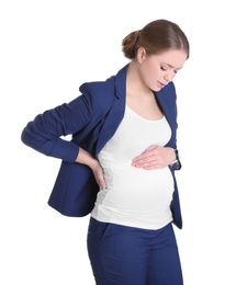 Photo of Young pregnant woman suffering from pain on white background. Working while expecting baby