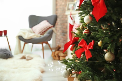 Photo of Christmas tree with stylish decor indoors, closeup