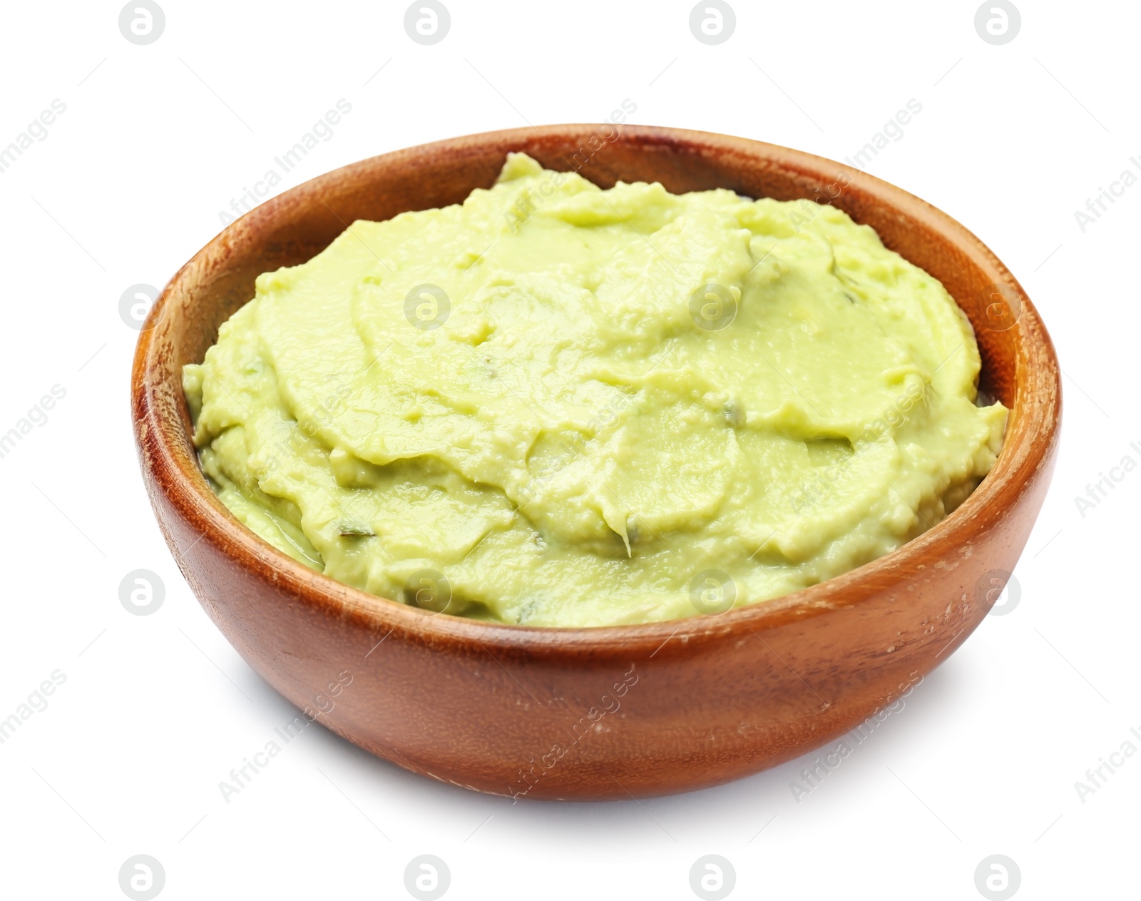 Photo of Bowl with guacamole made of ripe avocados on white background