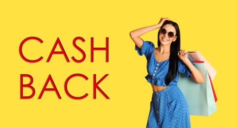 Image of Beautiful woman with shopping bags and words Cash Back on yellow background. Banner design