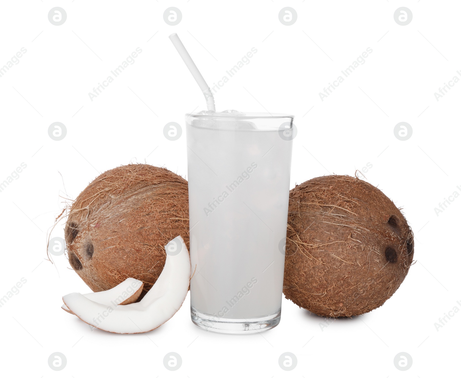 Photo of Glass of coconut water, ice cubes and nuts isolated on white