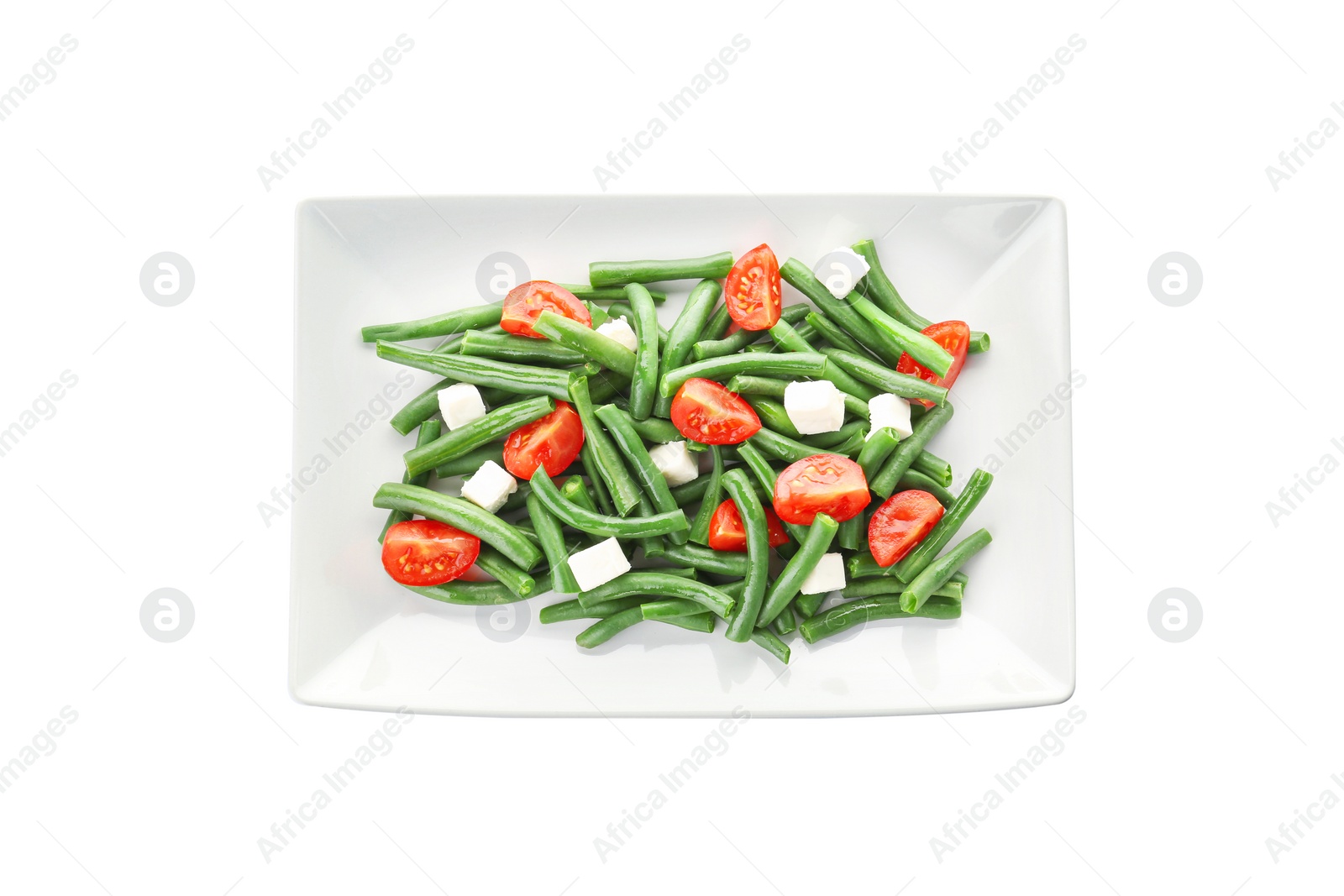 Photo of Plate with tasty green beans, tomatoes and cheese on white background