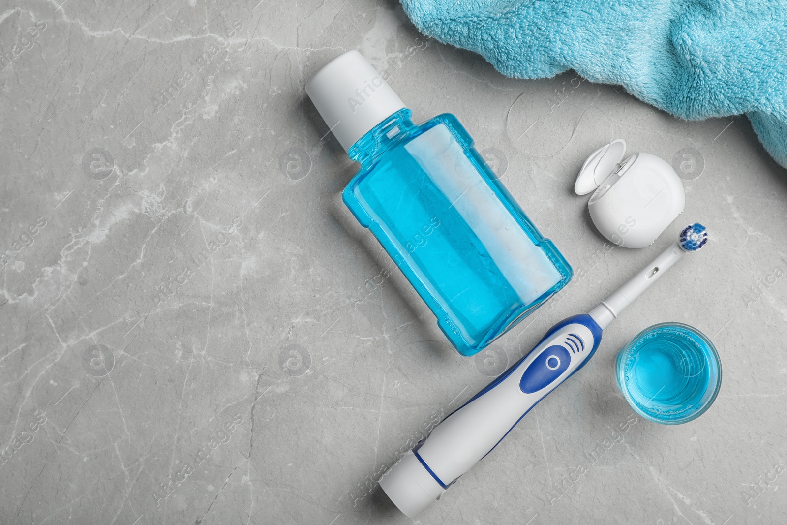 Photo of Flat lay composition with oral care products and space for text on light background. Teeth hygiene