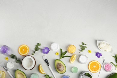 Photo of Flat lay composition with homemade cosmetic products and fresh ingredients on light grey background. Space for text