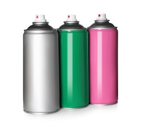 Photo of Colorful cans of spray paints on white background