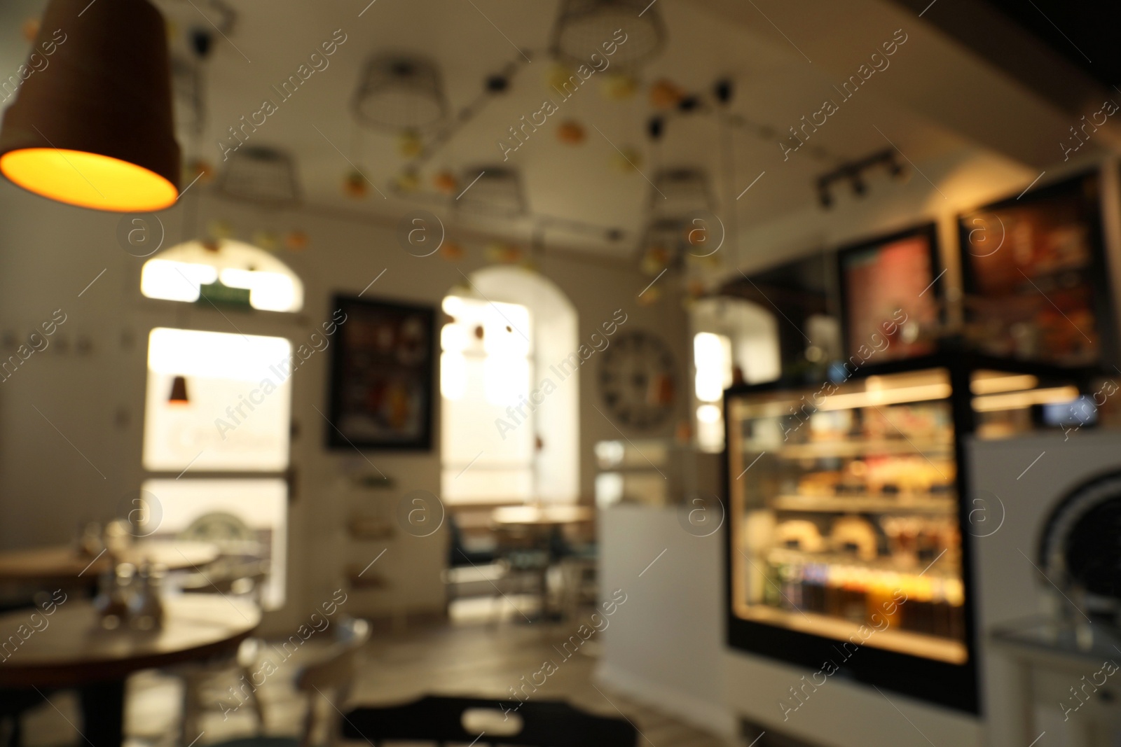 Photo of Blurred view of stylish modern cafe interior