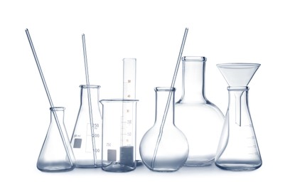 Empty clean laboratory glassware on white background