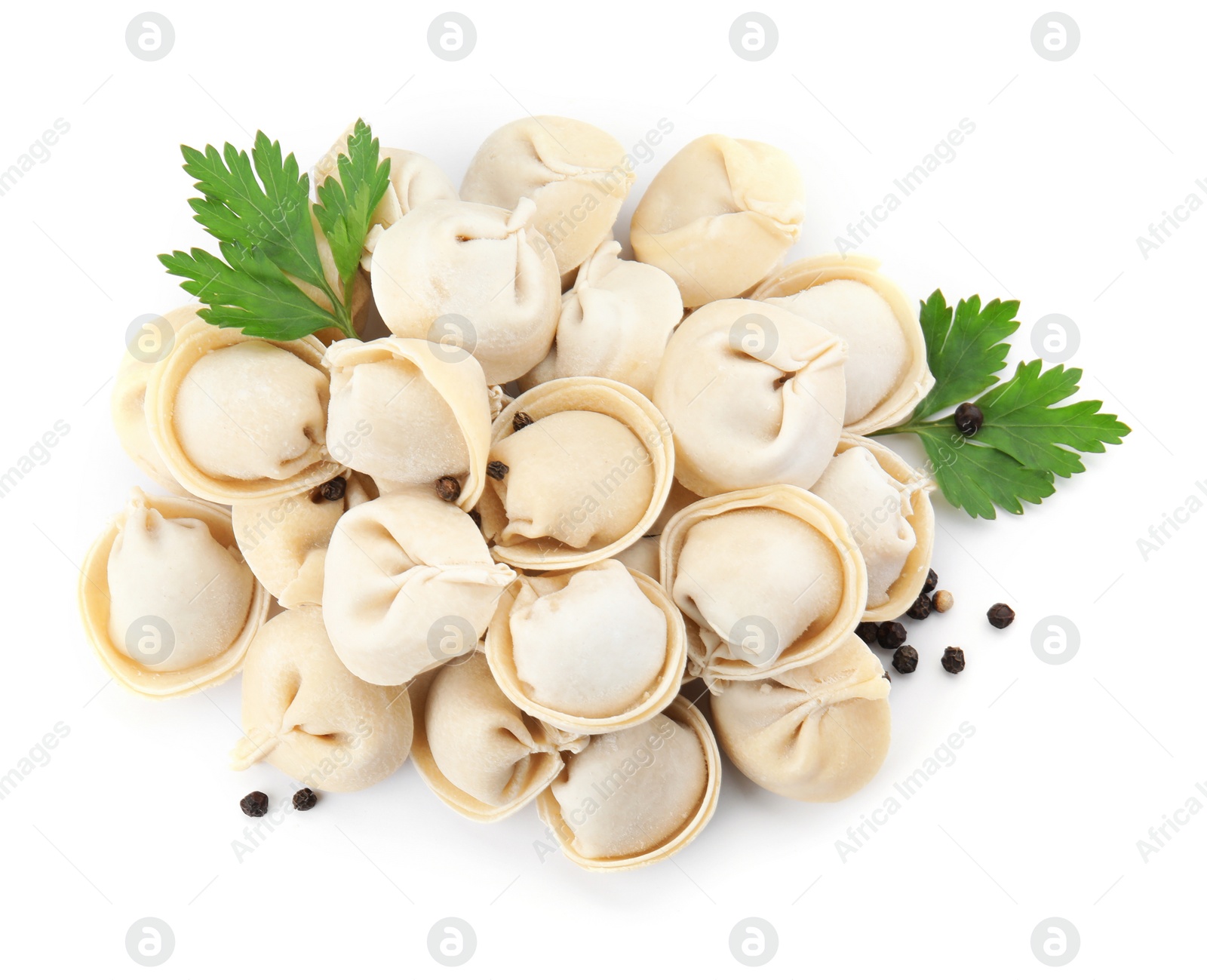 Photo of Raw dumplings on white background, top view. Home cooking