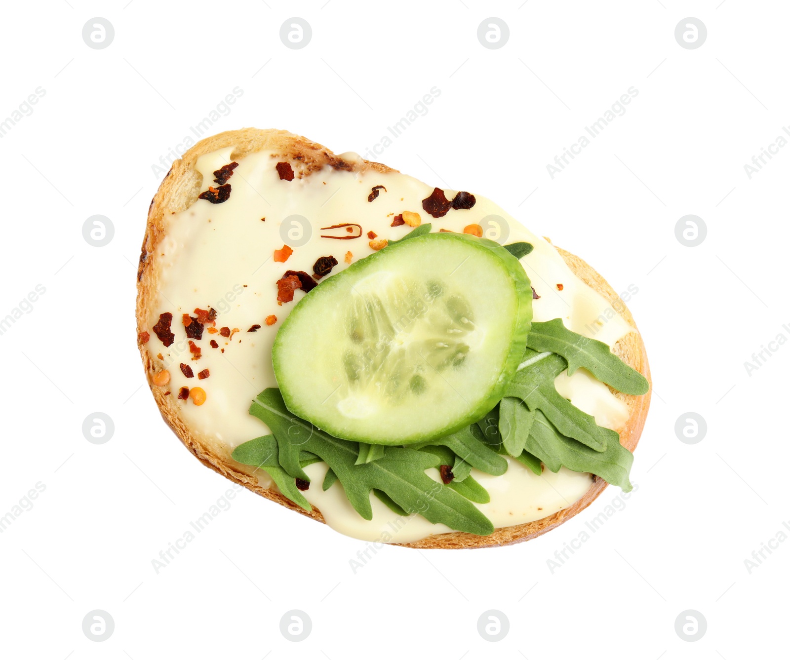 Photo of Slice of bread with spread, cucumber and arugula on white background, top view