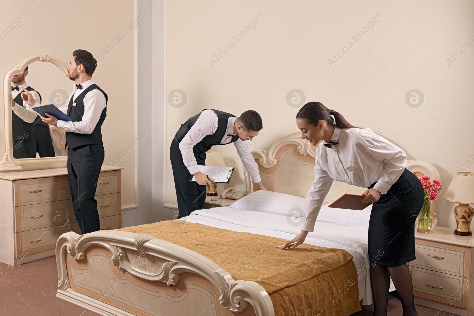 Photo of Group of people attending professional butler courses in hotel