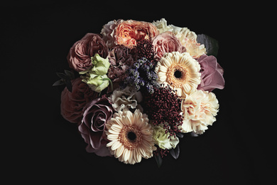 Beautiful bouquet on black background. Floral card design with dark vintage effect