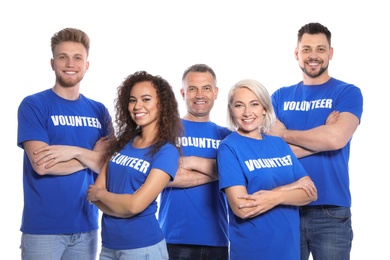 Team of volunteers in uniform on white background