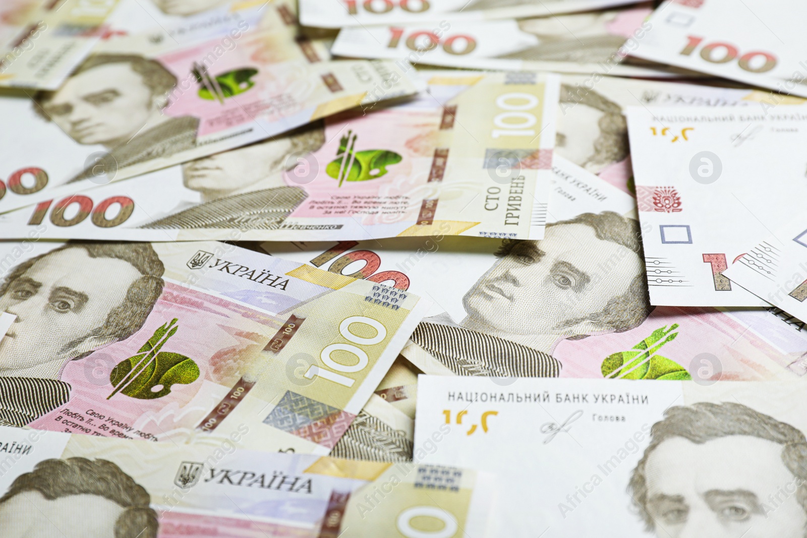 Photo of Closeup view of Ukrainian money as background. National currency