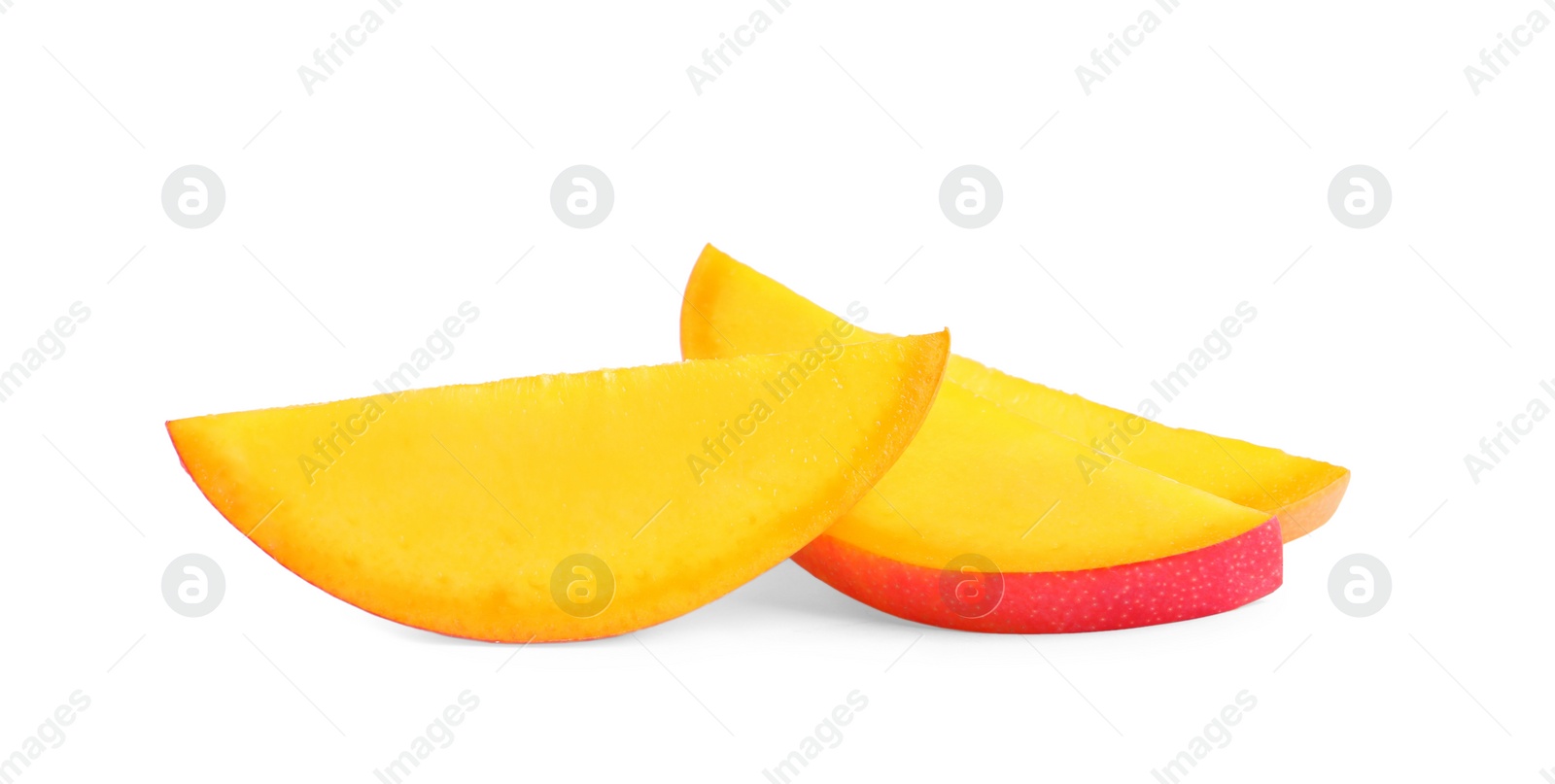 Photo of Juicy mango slices on white background. Tropical fruit