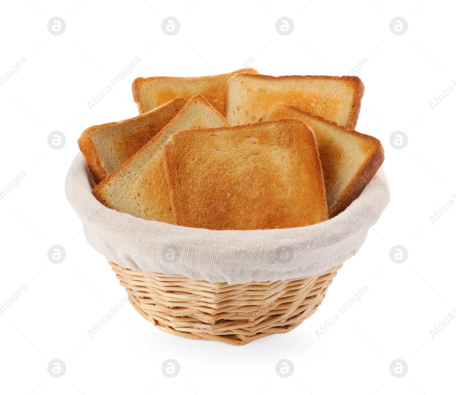 Photo of Wicker basket with slices of delicious toasted bread on white background