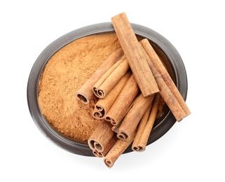 Bowl with aromatic cinnamon sticks and powder on white background