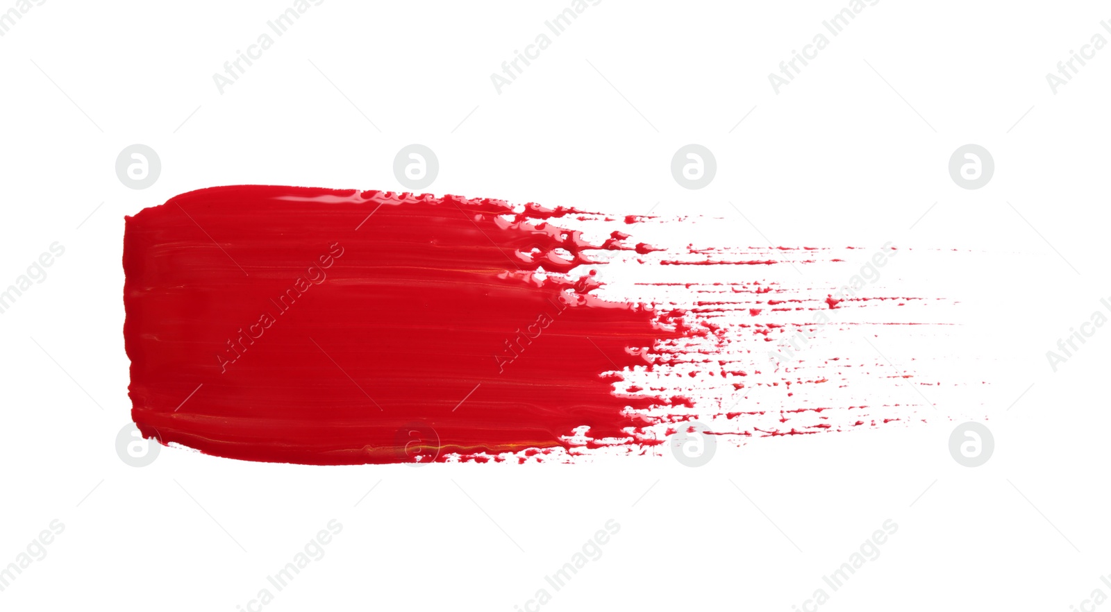 Photo of Abstract brushstroke of red paint isolated on white