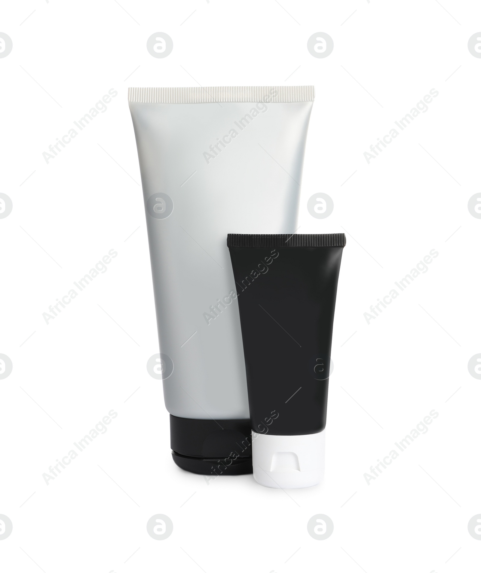 Photo of Tubes of men's facial creams on white background. Mockup for design