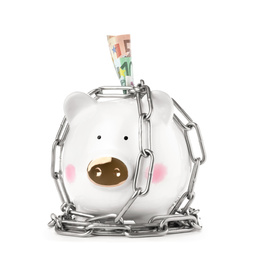 Photo of Piggy bank with steel chain and banknotes isolated on white. Money safety concept