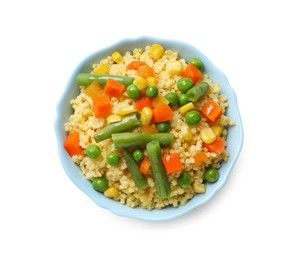 Photo of Tasty millet porridge with vegetables in bowl isolated on white, top view