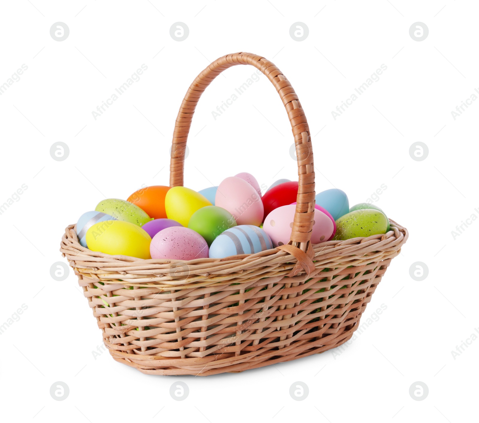 Photo of Wicker basket with beautifully painted Easter eggs isolated on white