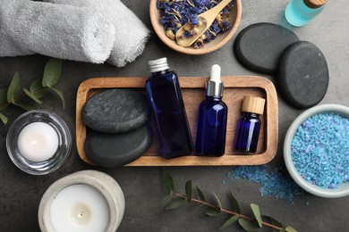 Photo of Flat lay composition with spa products on gray table