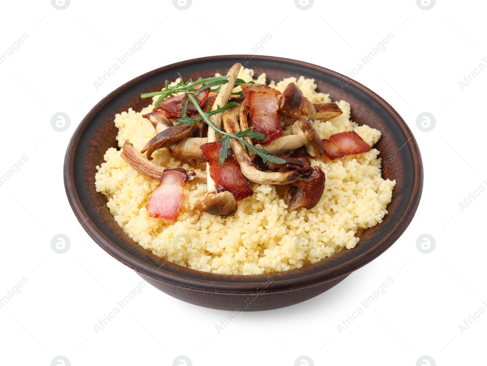 Photo of Tasty couscous with mushrooms and bacon in bowl isolated on white
