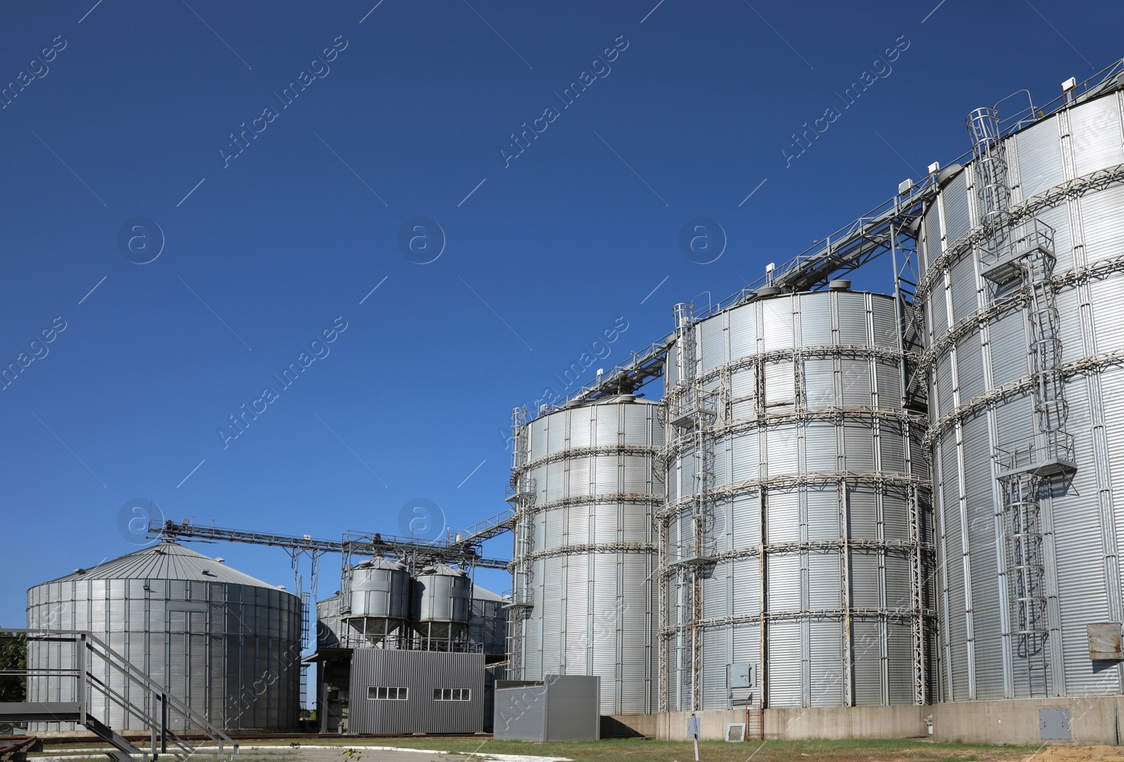 Photo of View of modern granaries for storing cereal grains outdoors