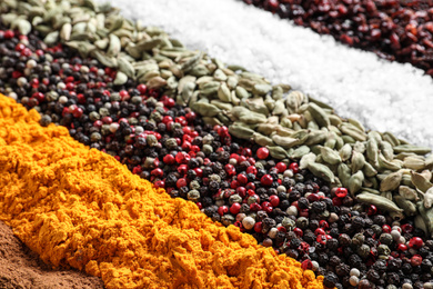 Many different spices as background, closeup view