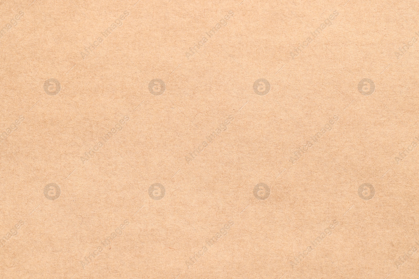 Photo of Texture of beige paper sheet as background, top view