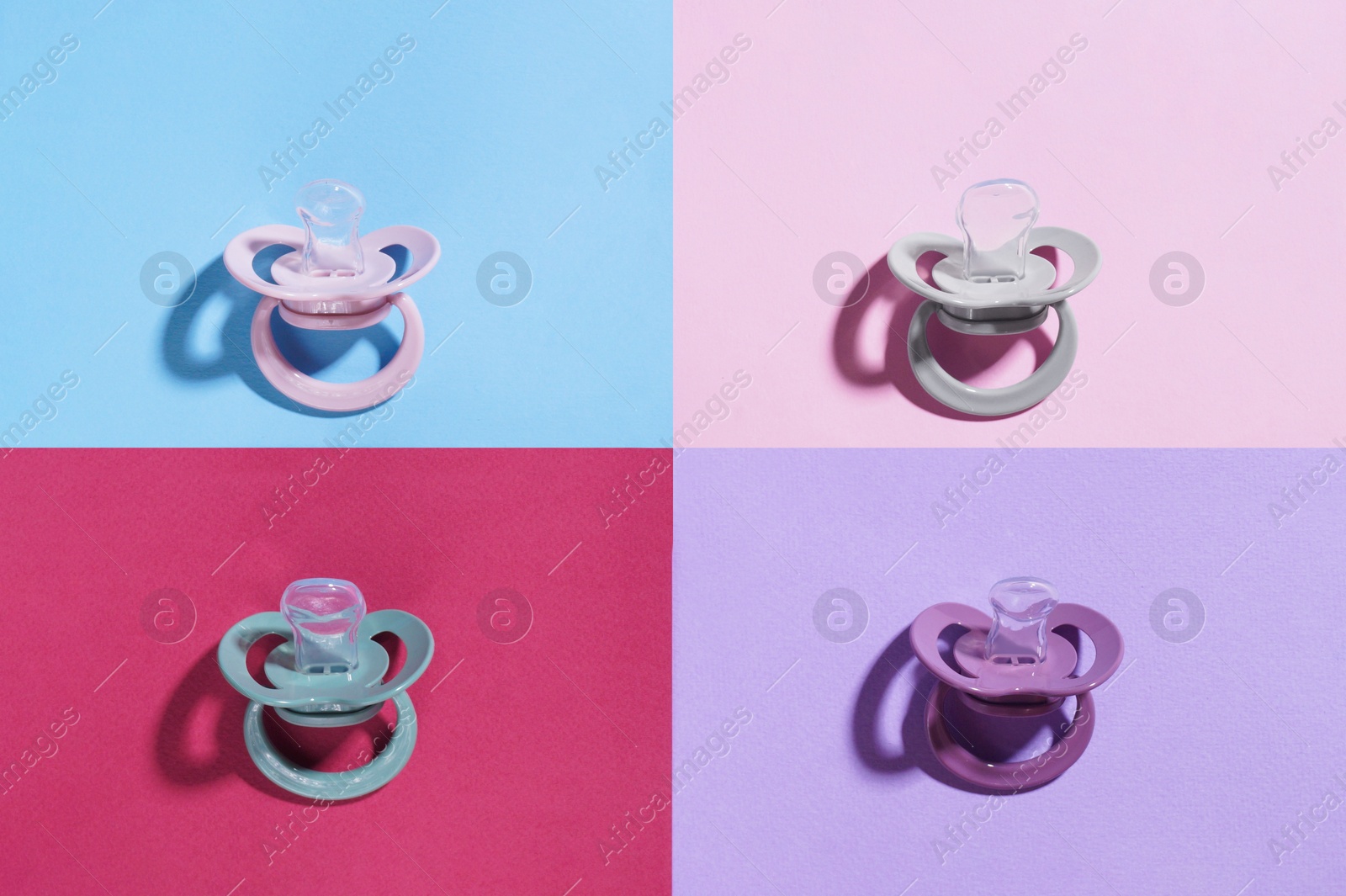 Photo of New baby pacifiers on color background, flat lay