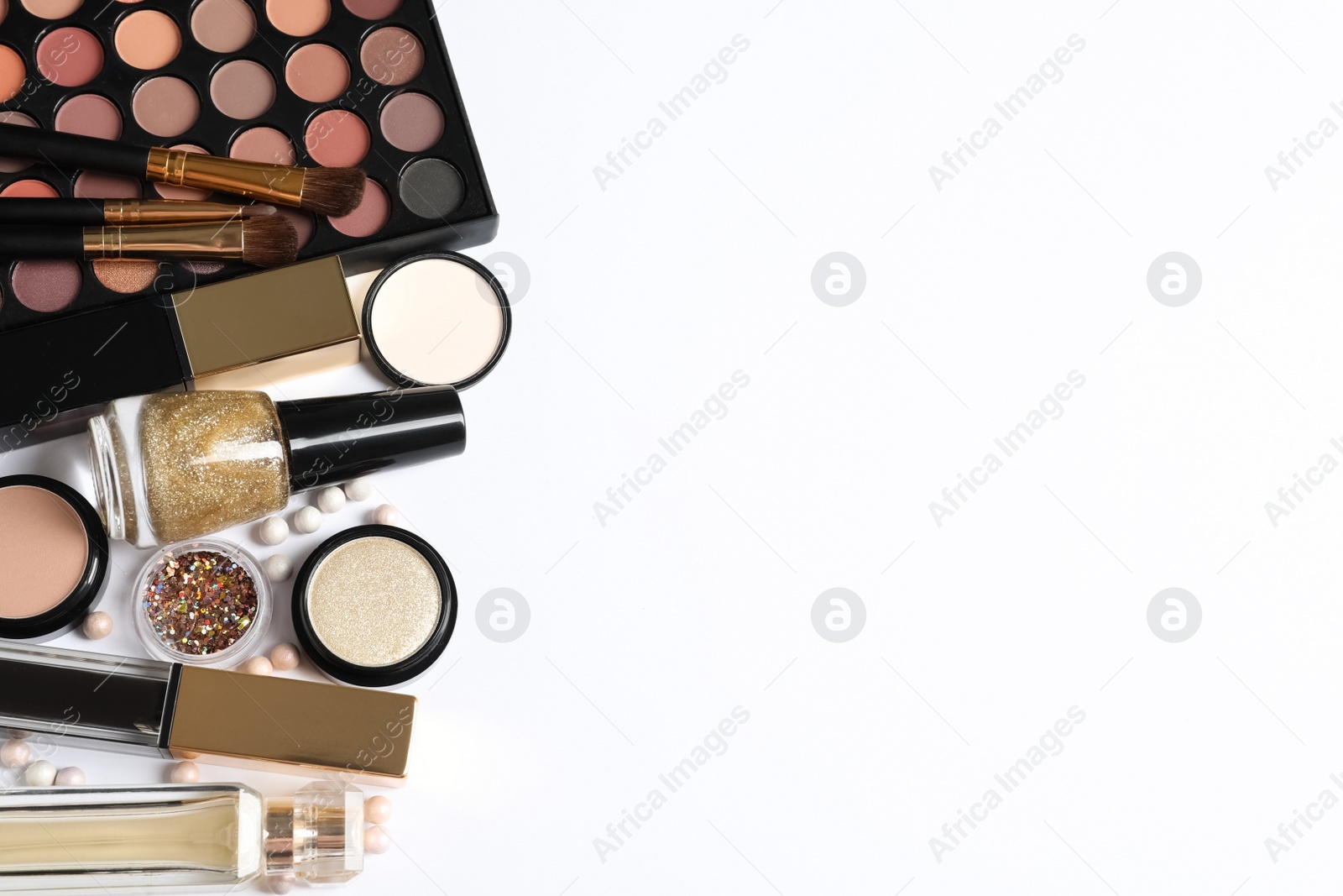 Photo of Set of luxury makeup products on white background, flat lay