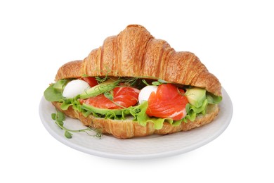 Photo of Tasty croissant with salmon, avocado, mozzarella and lettuce isolated on white